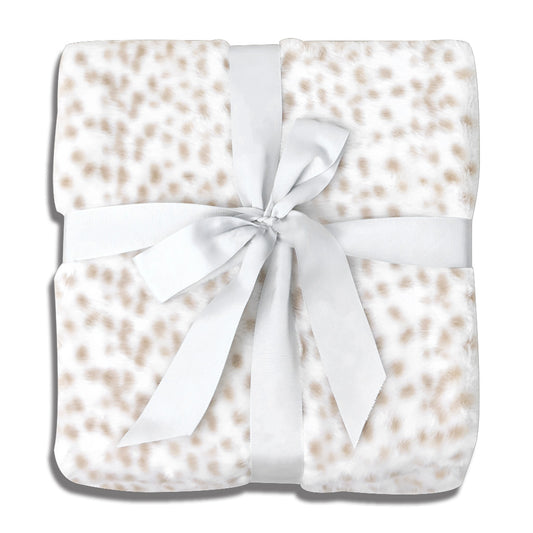 Square faux-leopard print throw blanket in ivory and caramel tones, featuring irregularly shaped soft-focus spots. Ultra-plush polyester velvet fabric with directional pile creates texture depth. Central satin ribbon accent adds tactile contrast. Displayed against clean white background, emphasizing its role as a versatile home decor piece.