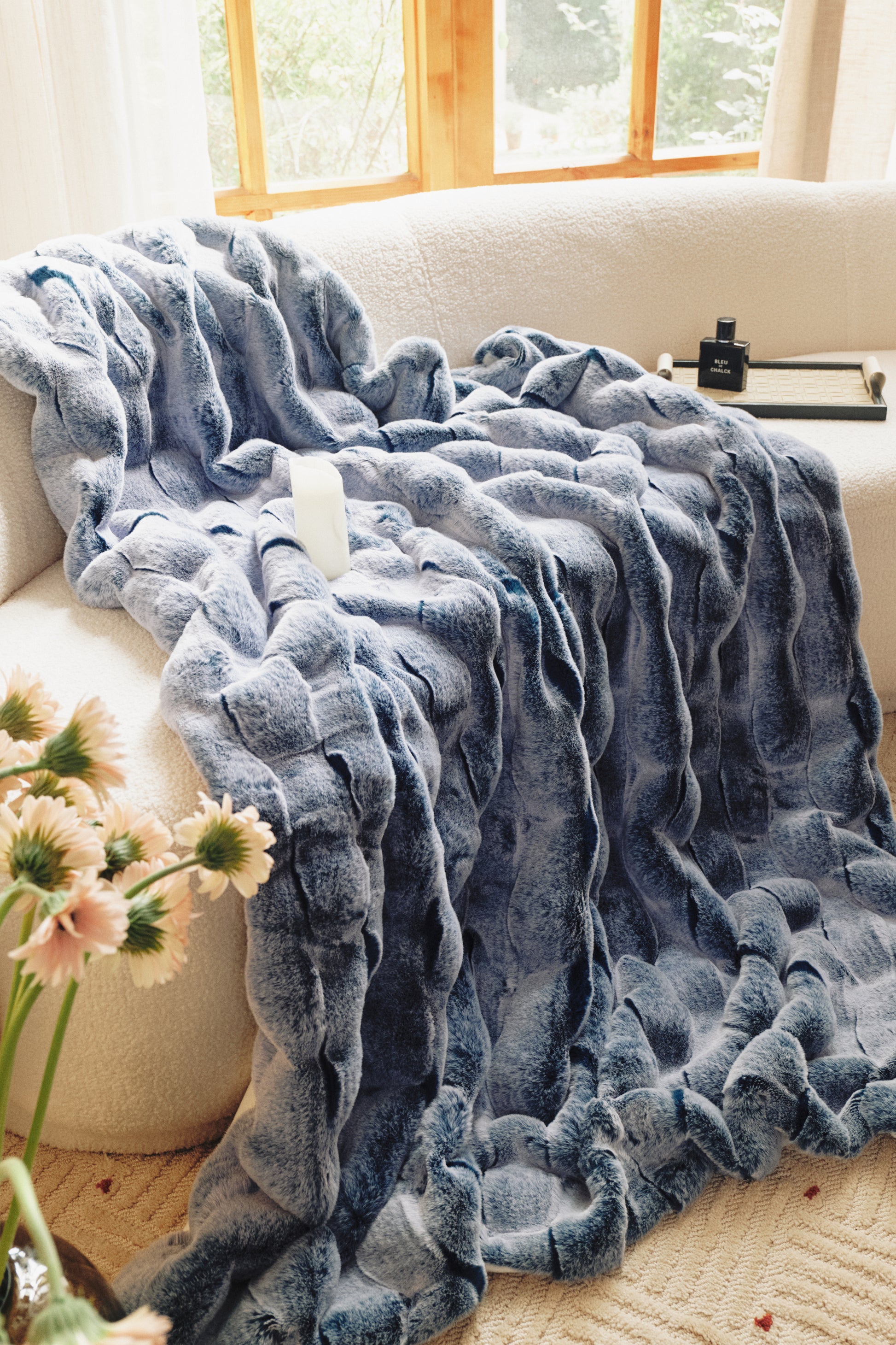 A serene blue gradient from navy to sky blue, featuring a silken chiffon texture and delicate embossed seashell patterns, evoking coastal tranquility.