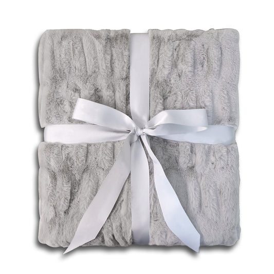A folded gray plush blanket tied with a white satin ribbon bow.