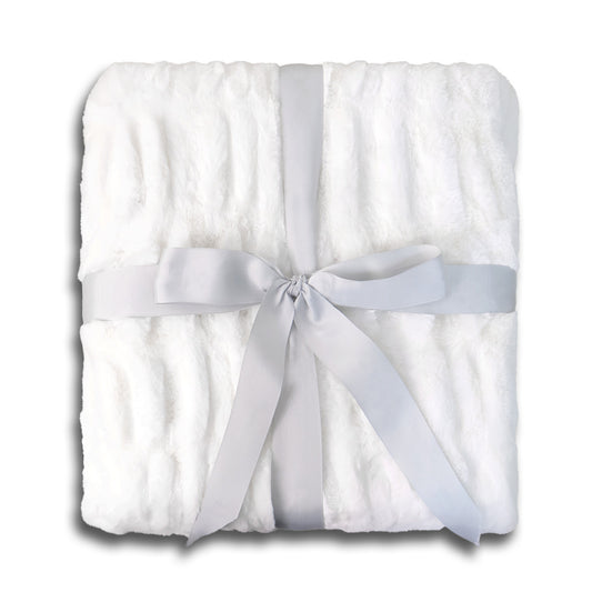 A white textured blanket folded with a light gray satin ribbon bow in the center.