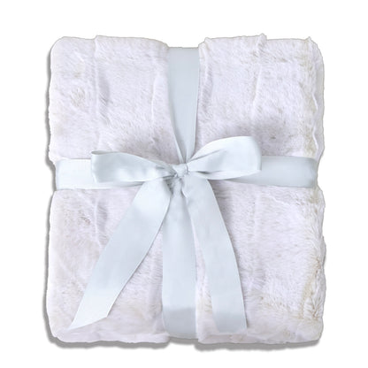 A folded white plush blanket with a soft, fluffy texture, adorned with a gray ribbon bow at the center. The clean white background highlights the item, creating an elegant and cozy atmosphere suitable for gift-giving or home decor.